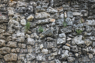 Ancient wall of uneven stones