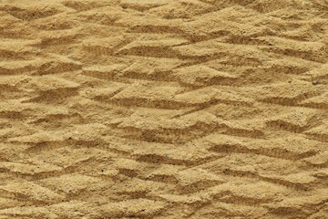 Background, texture of rough processed natural stone sandstone