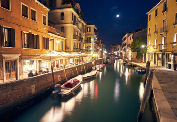 Fototapeta na wymiar The Grand Canal illuminated at night in Venice