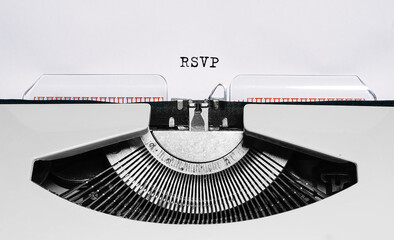Text rsvp typed on retro typewriter