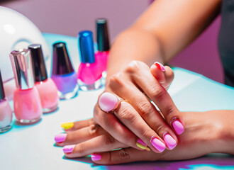 Obraz na płótnie Canvas Manicure concept Beautiful womans hands with perfect manicure at beauty salon. Generated AI