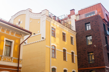 cityscape, urban background, group of facades of modern and vintage buildings