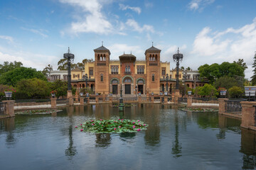 Fototapeta na wymiar Plaza de America Central Pond and Mudejar Pavilion at Maria Luisa Park - Seville, Andalusia, Spain