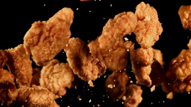 Nuggets fly up and fall down. Filmed is slow motion 1000 fps. High quality FullHD footage