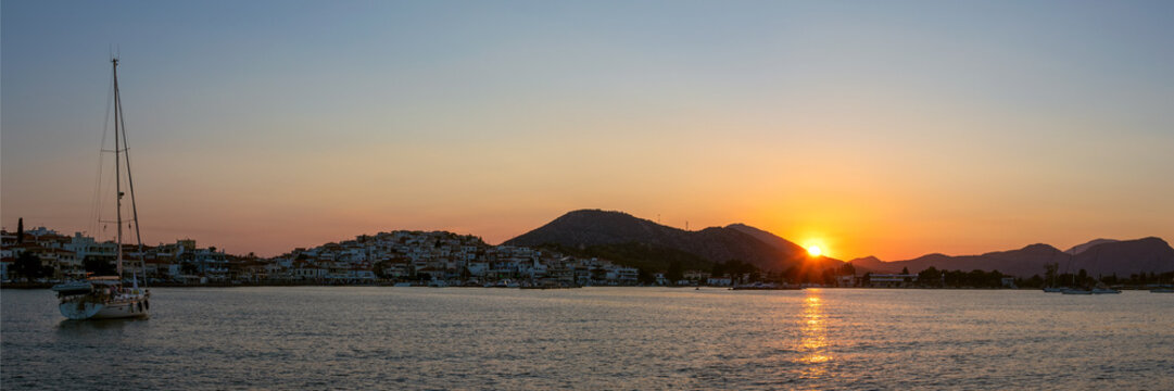 Panoramic View of yachts at anchor in the bay of Ermioni, Greece at sunset