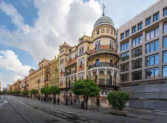 Fototapeta na wymiar Edificio La Adriatica at Avenida de la Constitucion Street - Seville, Andalusia, Spain