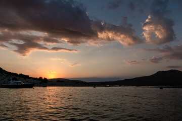 Naklejka na ściany i meble Sunset over the Island of Elafonisos, on the southern tip of the Peloponnese Peninsula