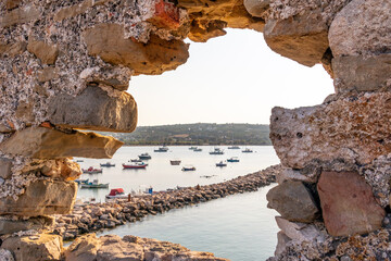 Fishing boats through the walls of Methoni Fortress
