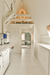 a laundry room with washer, dryer and washing machine in the corner on the wall is painted white