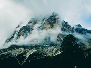 Majestic mountain among the clouds. Mountain landscape in the Dolomites among rain clouds....