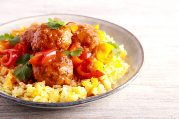 Sweet and sour meatballs with pepper and gravy