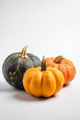 Three assorted pumpkins isolated on white background, vertical. AI generated Generative AI