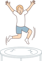 Teenage boy jumps on trampoline enjoying outdoor activities and exercising in gym
