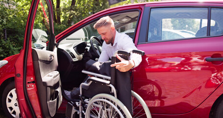 Fototapeta na wymiar Driver With Disability Getting In Car