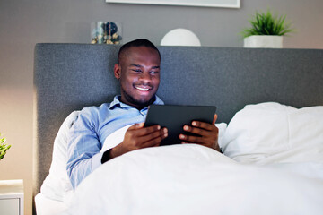 Man Lying On Bed Looking