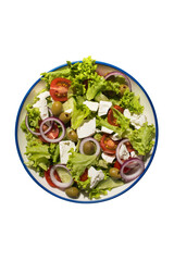 Greek salad with vegetables and cheese isolated on a white background