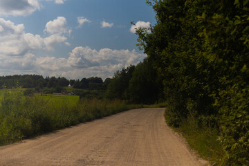Beautiful rural road in the countryside, day landscape