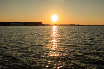 Evening landscape, sunrise or sunset on the lake or the sea