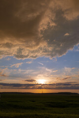 Obraz na płótnie Canvas Summer landscape, Sun and sunbeams, sunset sky