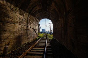 Fototapeta na wymiar Light at the end of railroad tunnel