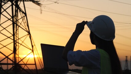 silhouette electrical engineer, work computer tablet sunset, electric tower, digital hand, power engineer sunset background, people working electrical room, engineer working with digital tablet