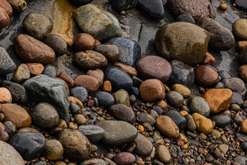Colored pebbles and rocks on beach