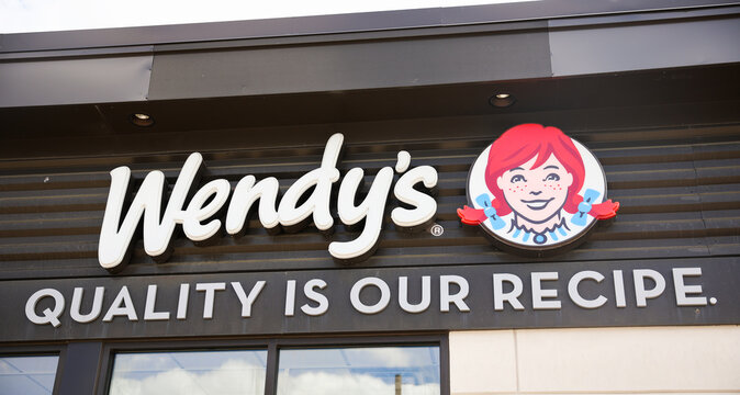 Providence, Rhode Island, USA, May 27, 23: A vibrant image of Wendy's fast food restaurant, evoking a sense of deliciousness, convenience, and American fast food culture