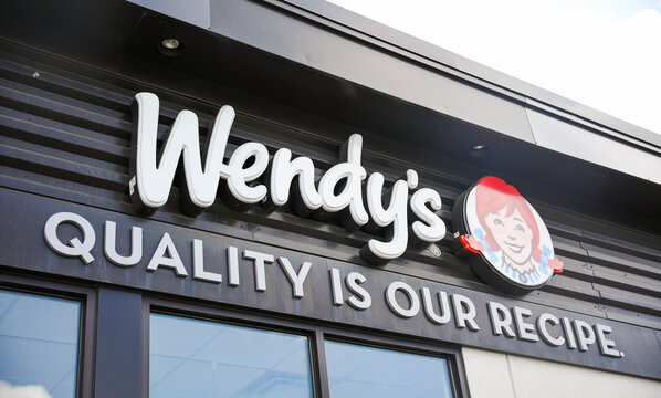 Providence, Rhode Island, USA, May 27, 23: A vibrant image of Wendy's fast food restaurant, evoking a sense of deliciousness, convenience, and American fast food culture