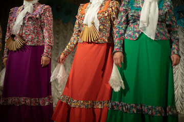 Russian folk costume. Folk clothes. Folklore ensemble.