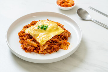 kimchi fried rice with pork and topped cheese