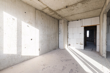 Empty concrete commercial space without finishing with partitions