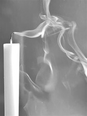 White candles in tone after the color of smoke with a faint smoke.