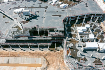 empty building site. construction work progress stop. aerial photo from the drone.