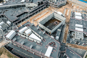 abandoned construction site of commercial center. concept of economical crisis. drone photo looking down.