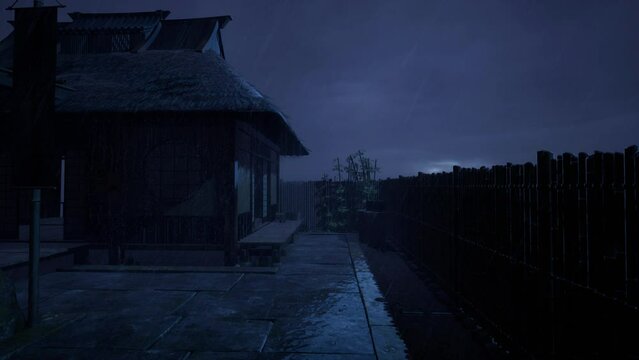 Heavy rain falls on the old house at night