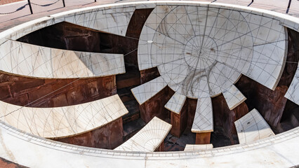 Astrological device Jaya Prakash Yantra in the form of a hemisphere. Lines and meridians are...