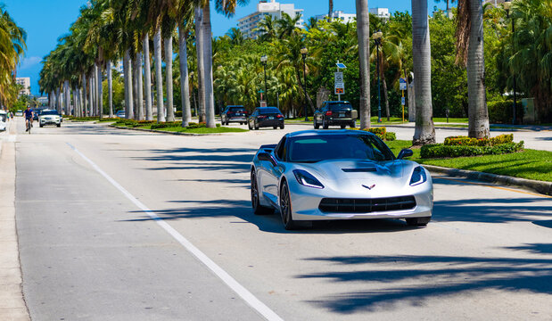 Miami, Florida USA - March 25, 2023: white Chevrolet Corvette C7 Z06 Z07 Stage 2 Style Carbon Fiber Front Bumper Lower Lip Splitter, front view
