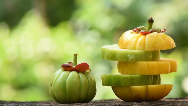 Garcinia atroviridis or Garcinia fruit on nature background.