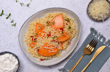 Pasta with fried pumpkin slices