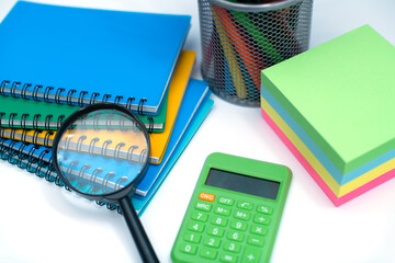 Collection different bright school stationery  and notebooks on white background. Back to school concept.