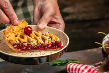 slice of cherry pie, Flaky Crust, piece on a plate and the whole homemade cherry pie, Long banner format. top view