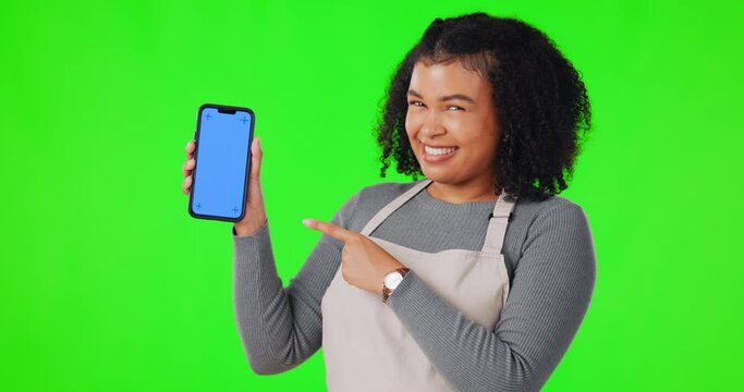 Woman, happy and pointing at tablet for advertising mockup, chroma key on studio green screen background. Portrait of female with mobile display for digital product, marketing or promotion mock up