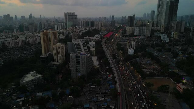 Dindoshi city evening bird eye view drone moving front in mumbai