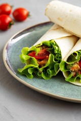 Homemade Avocado Tuna Wraps on a Plate , side view. Close-up.