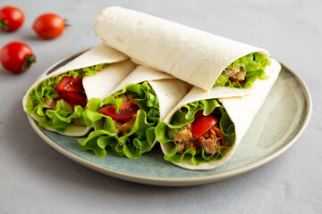 Homemade Avocado Tuna Wraps on a Plate , side view.