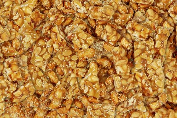 Nut Bars texture for background. Peanut Bar snack are made from mixing and compressing peanuts,...