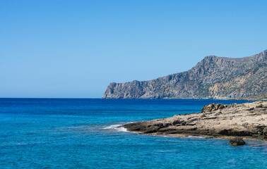 Fototapeta premium the sea on the rocky coast reflects the sky