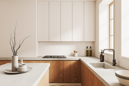 Stylish kitchen interior with kitchenware, bar countertop and panoramic window