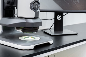 Optic machine for precise measurement of part size and quality evaluation. Smart factory.	