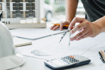 Architect working on the desk, construction project ideas architecture engineer Concept..